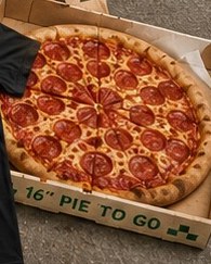 Whole 16-inch Spanky's Pizza pepperoni pie in the box